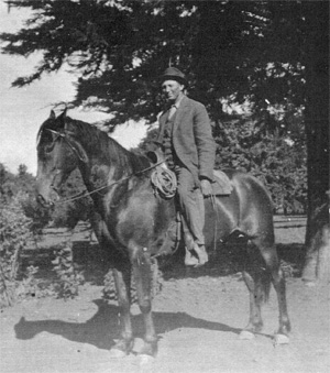 Photo of Bethel on a horse at the ranch.